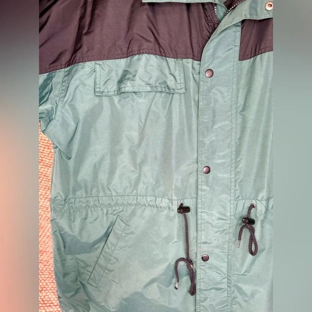 Vintage Teal and Black Caterpillar Windbreaker